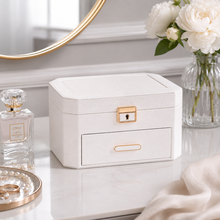 Load image into Gallery viewer, White Decor Home jewellery storage box with a lock and drawer on a vanity table.