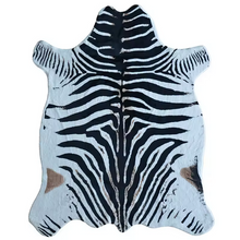 Load image into Gallery viewer, Zebra print artificial cowhide rug with black and white stripes, animal pattern decor
