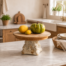 Load image into Gallery viewer, French Provincial wooden pedestal stand with a rustic white base displaying a pumpkin and lemons.
